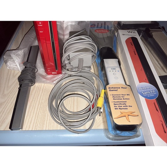 wii console ,power Cord ,new Ultra Sensor Bar ,2 New Sport Paddles , - Picture 3 of 6